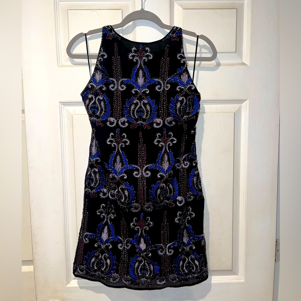 Shift embroidered and beaded black XS dress.